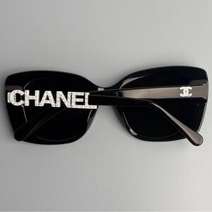 CHANEL Elegant Black Sunglasses with Crystal Logo
